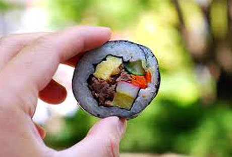A person holding Kimpab.